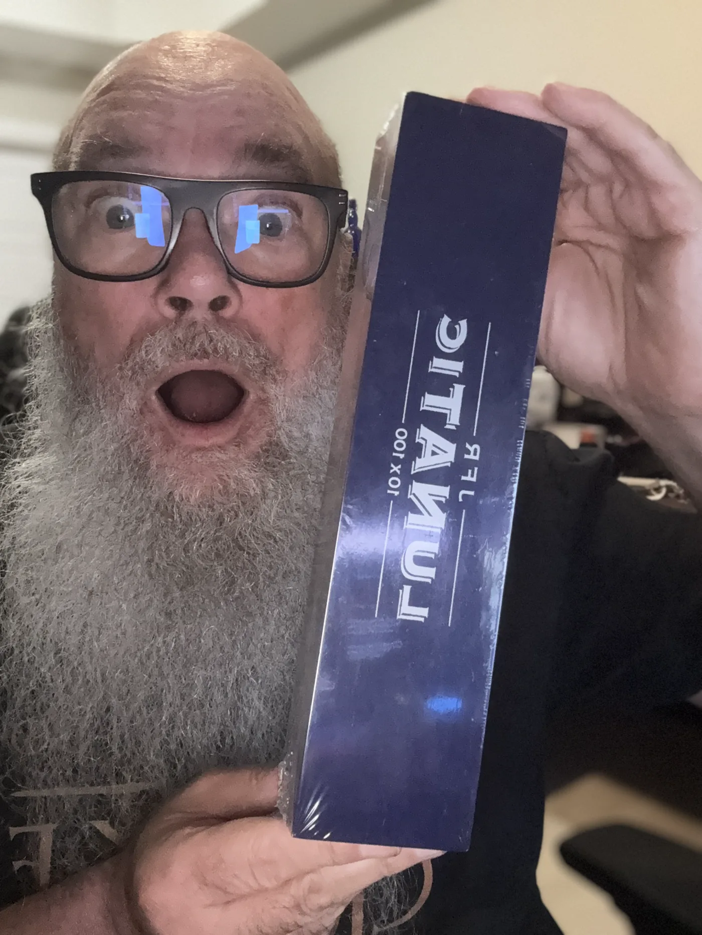 Norm Farrar holding a JFR Lunatic 10 by 100 box