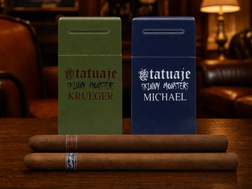 Tatuaje Skinny Monsters Krueger and Michael packs, green and navy, with the two thin 6 x 38 cigars in front